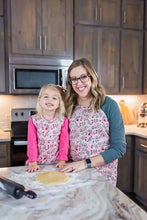 Load image into Gallery viewer, Blushing Blooms Apron - fits sizes youth small through adult 2XL